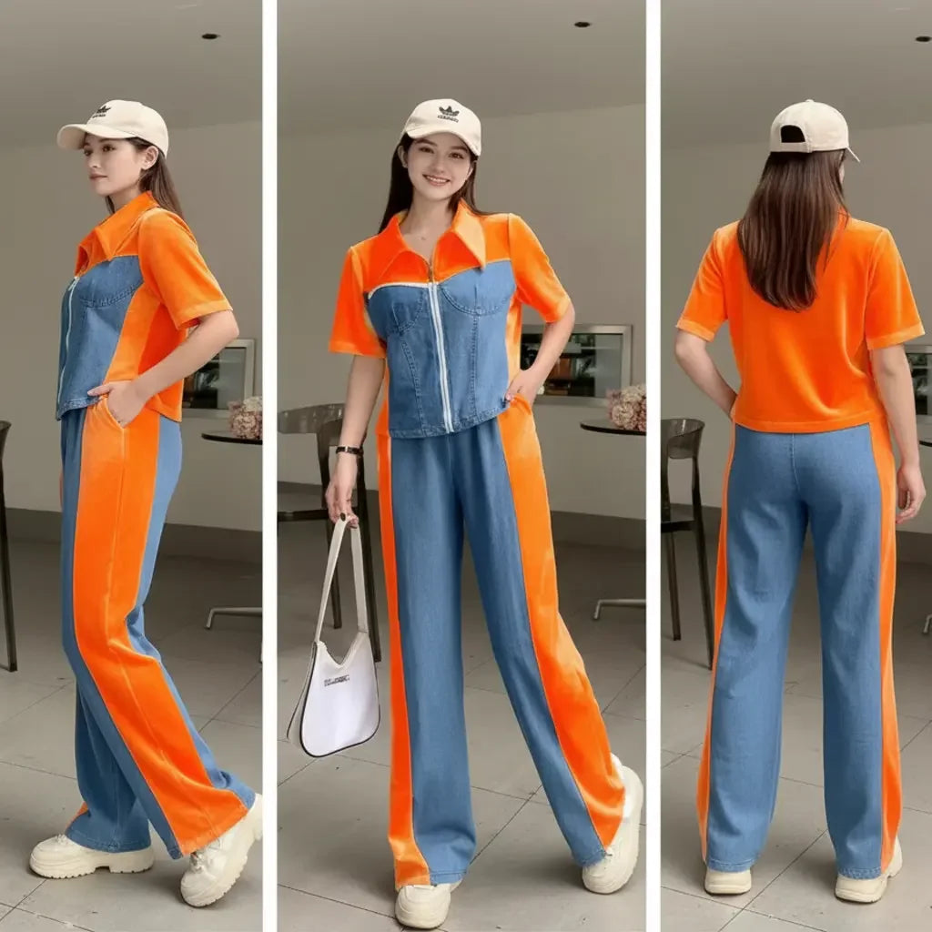 Woman wearing an orange and blue denim co-ord set with a cap, standing in a room.